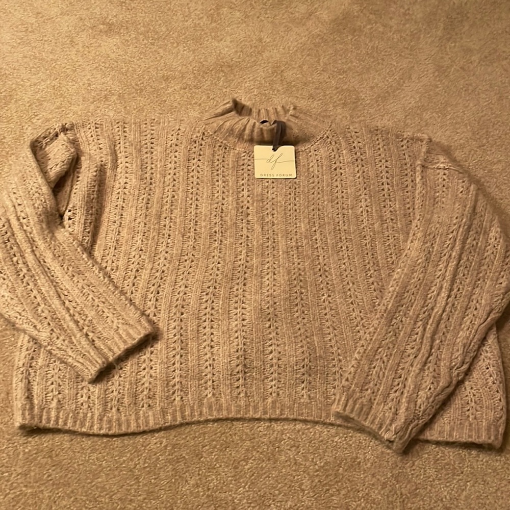Brand new with tags. Dress forum sweater.